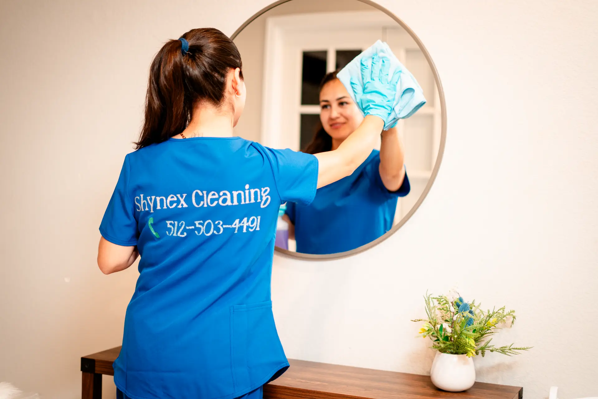 Cleaning a mirror during a home visit